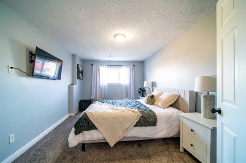 2521 11 Avenue, Wainwright, AB - Indoor Photo Showing Bedroom