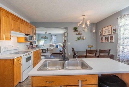 502 5 Avenue, Wainwright, AB - Indoor Photo Showing Kitchen With Double Sink