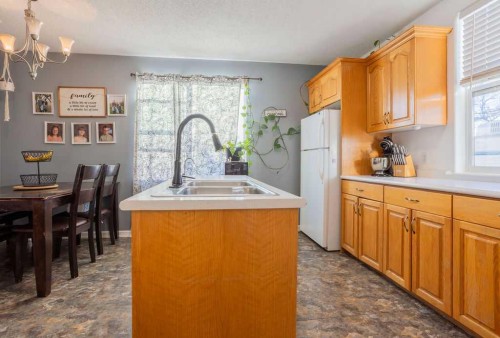 502 5 Avenue, Wainwright, AB - Indoor Photo Showing Kitchen With Double Sink