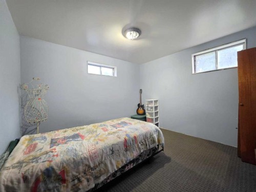 1017 12 Avenue, Wainwright, AB - Indoor Photo Showing Bedroom