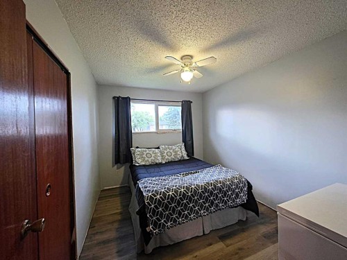 1017 12 Avenue, Wainwright, AB - Indoor Photo Showing Bedroom