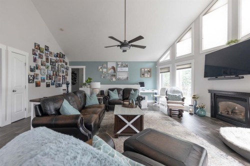4 Sandpiper Estates, Sandy Beach, AB - Indoor Photo Showing Living Room With Fireplace