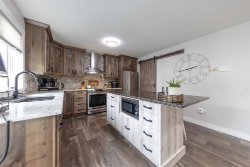 4 Sandpiper Estates, Sandy Beach, AB - Indoor Photo Showing Kitchen With Upgraded Kitchen