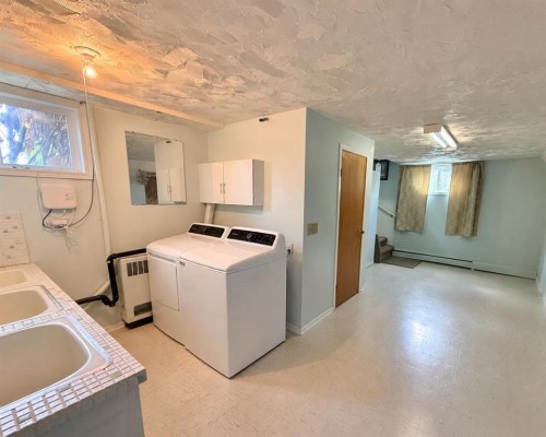 215 14 Street, Wainwright, AB - Indoor Photo Showing Laundry Room
