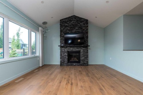 6113 20 Street Close, Lloydminster, AB - Indoor Photo Showing Living Room With Fireplace