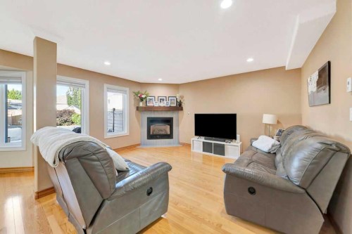 4005 60Th Avenue, Lloydminster, AB - Indoor Photo Showing Living Room With Fireplace
