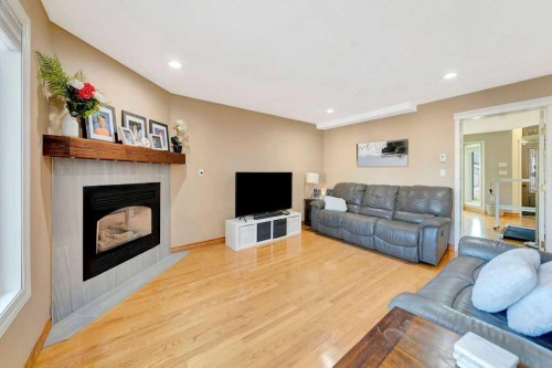 4005 60Th Avenue, Lloydminster, AB - Indoor Photo Showing Living Room With Fireplace
