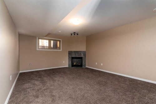 59-2715 73 Avenue, Lloydminster, AB - Indoor Photo Showing Other Room With Fireplace