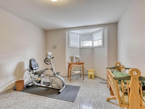 254209 Woodland Road, Rural Rocky View County, AB - Indoor Photo Showing Gym Room