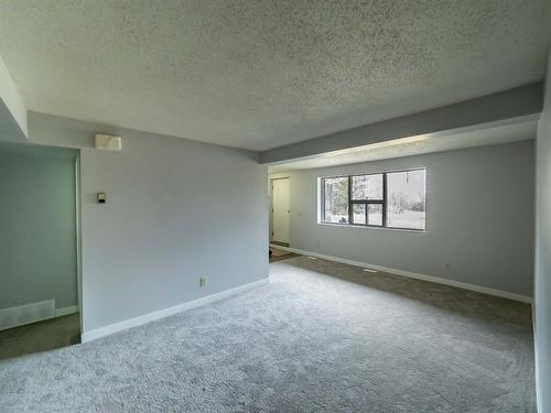 1-4-415 Royal Avenue Nw, Diamond Valley, AB - Indoor Photo Showing Other Room