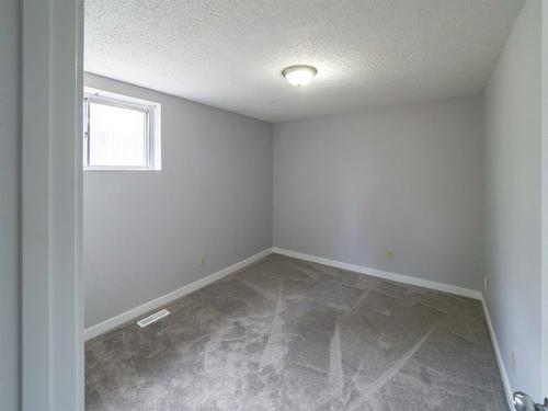 1-4-415 Royal Avenue Nw, Diamond Valley, AB - Indoor Photo Showing Other Room