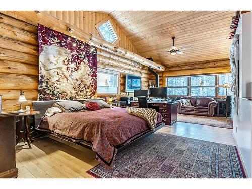 104 White Avenue, Bragg Creek, AB - Indoor Photo Showing Bedroom