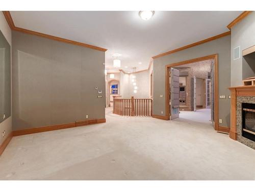 135 Eagle Ridge Drive Sw, Calgary, AB - Indoor With Fireplace