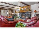 140 Kootenay Avenue, Banff, AB  - Indoor Photo Showing Living Room With Fireplace 