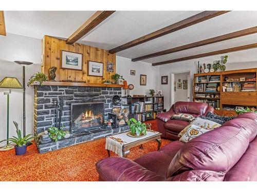 140 Kootenay Avenue, Banff, AB - Indoor Photo Showing Living Room With Fireplace