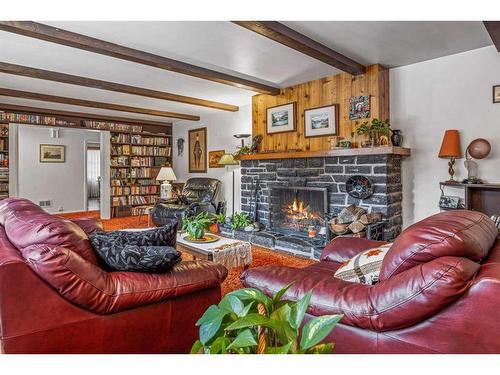 140 Kootenay Avenue, Banff, AB - Indoor Photo Showing Living Room With Fireplace