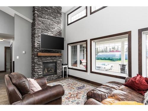 204022 Highway 564, Hussar, AB - Indoor Photo Showing Living Room With Fireplace