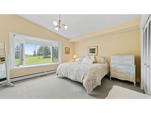 100-80054 226 Avenue West, Rural Foothills County, AB - Indoor Photo Showing Bedroom