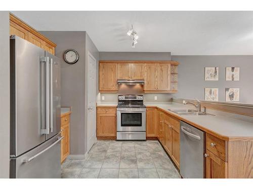 7C Otter Lane, Banff, AB - Indoor Photo Showing Kitchen With Double Sink