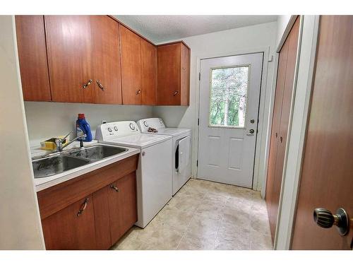 25039 A & B Township Road 542, Marwayne, AB - Indoor Photo Showing Laundry Room