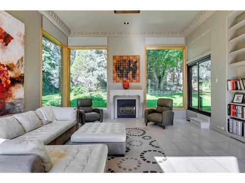 40 Eagle Ridge Place Sw, Calgary, AB - Indoor Photo Showing Living Room With Fireplace