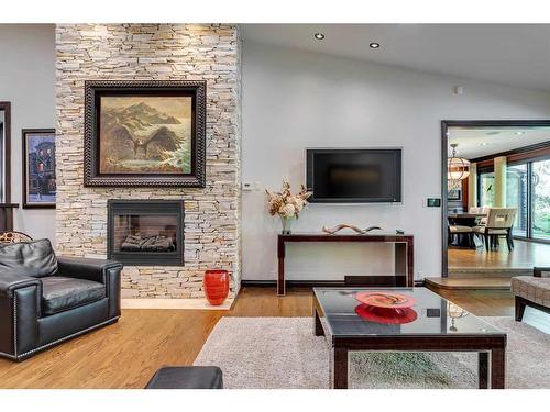 40 Eagle Ridge Place Sw, Calgary, AB - Indoor Photo Showing Living Room With Fireplace
