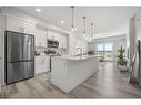 317-80 Carrington Plaza Nw, Calgary, AB  - Indoor Photo Showing Kitchen With Stainless Steel Kitchen With Upgraded Kitchen 