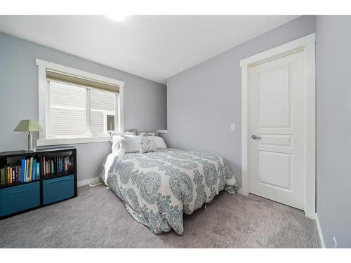 122 Ypres Green Sw, Calgary, AB - Indoor Photo Showing Bedroom
