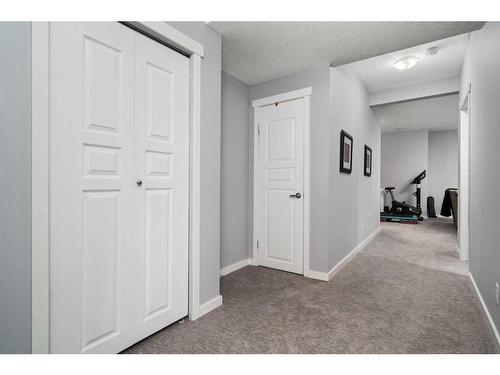 122 Ypres Green Sw, Calgary, AB - Indoor Photo Showing Other Room