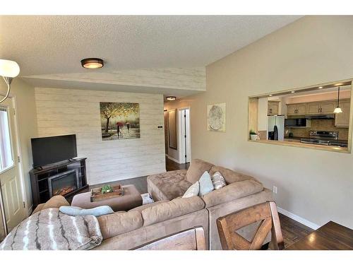 484063 Range Road 20, Blackfoot, AB - Indoor Photo Showing Living Room With Fireplace