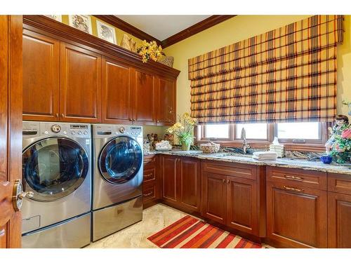 240046 284, Carbon, AB - Indoor Photo Showing Laundry Room