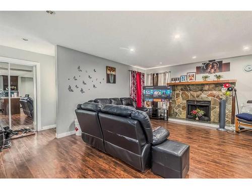 108 Whiteram Close Ne, Calgary, AB - Indoor Photo Showing Other Room With Fireplace