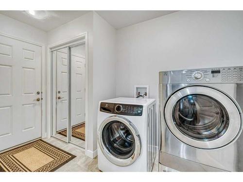 1-108 Juniper Road, Vulcan, AB - Indoor Photo Showing Laundry Room