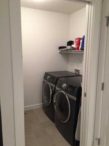 200 Nolanfield Way Nw, Calgary, AB - Indoor Photo Showing Laundry Room