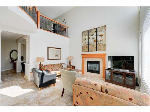 71 Copperstone Drive Se, Calgary, AB - Indoor Photo Showing Living Room With Fireplace
