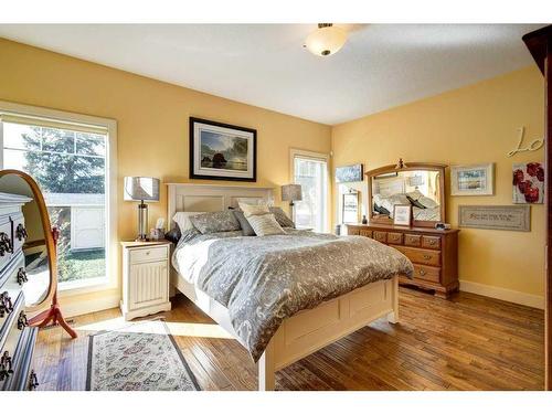 672 Royalite Way Se, Diamond Valley, AB - Indoor Photo Showing Bedroom
