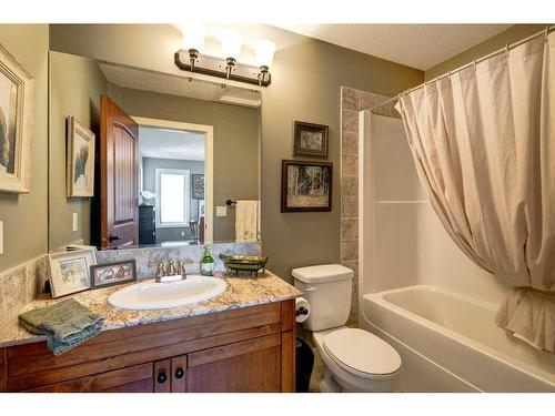 672 Royalite Way Se, Diamond Valley, AB - Indoor Photo Showing Bathroom