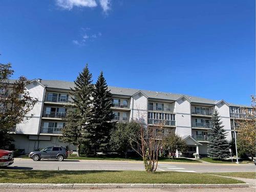 #406-4514 54 Avenue, Olds, AB - Outdoor With Facade