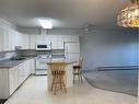 #406-4514 54 Avenue, Olds, AB  - Indoor Photo Showing Kitchen With Double Sink 