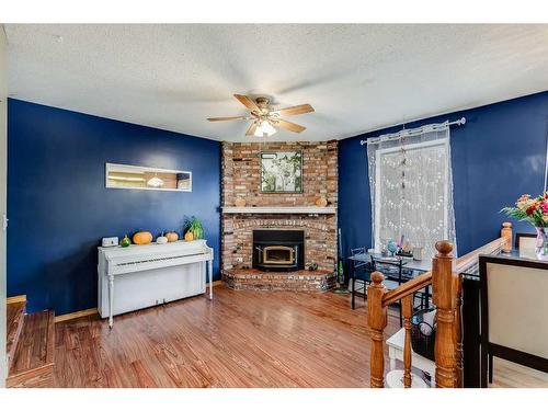 5306 57 Avenue, Olds, AB - Indoor With Fireplace