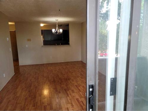 209-1712 38 Street Se, Calgary, AB - Indoor Photo Showing Other Room