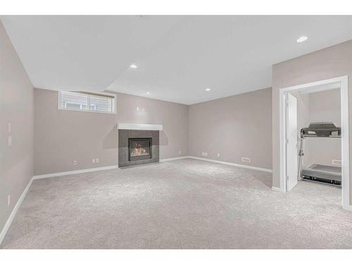 79 Evansfield Road Nw, Calgary, AB - Indoor With Fireplace