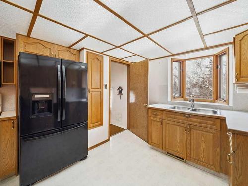 7504 Elbow Drive Sw, Calgary, AB - Indoor Photo Showing Kitchen With Double Sink