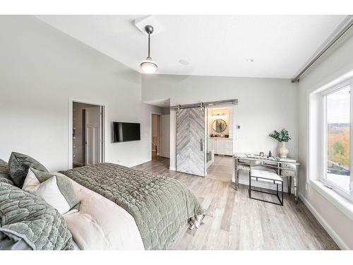150 Riviera View, Cochrane, AB - Indoor Photo Showing Bedroom