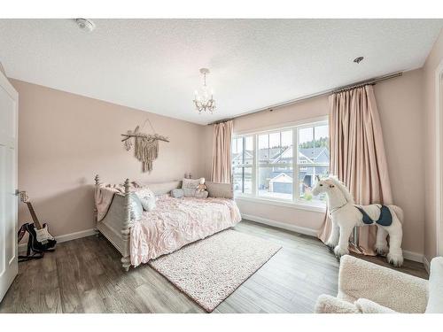 150 Riviera View, Cochrane, AB - Indoor Photo Showing Bedroom