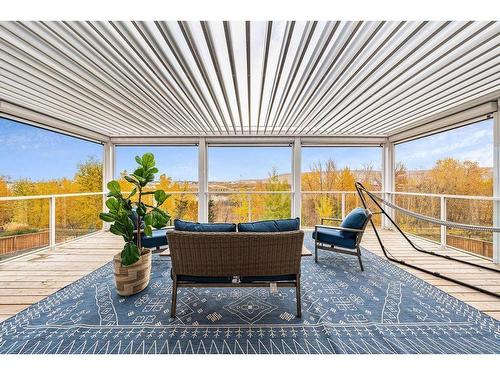 150 Riviera View, Cochrane, AB - Outdoor With Deck Patio Veranda With Exterior
