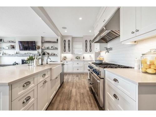 150 Riviera View, Cochrane, AB - Indoor Photo Showing Kitchen With Upgraded Kitchen