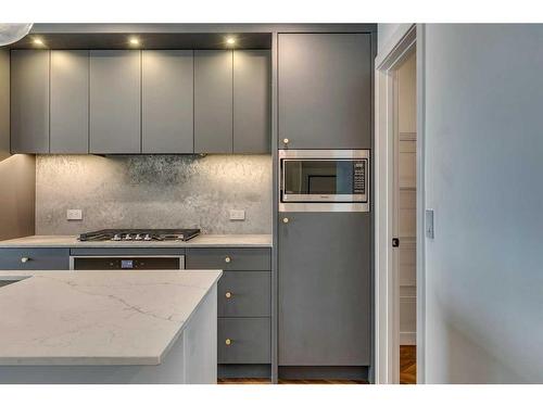 514-8445 Broadcast Avenue Sw, Calgary, AB - Indoor Photo Showing Kitchen With Upgraded Kitchen