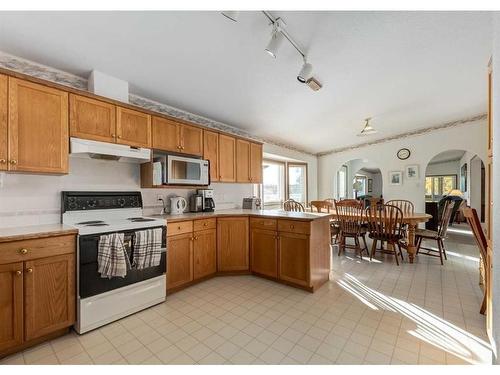 33567 Highway 584, Rural Mountain View County, AB - Indoor Photo Showing Kitchen With Double Sink