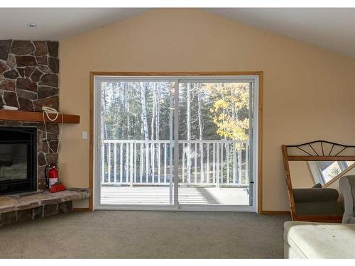33567 Highway 584, Rural Mountain View County, AB - Indoor With Fireplace